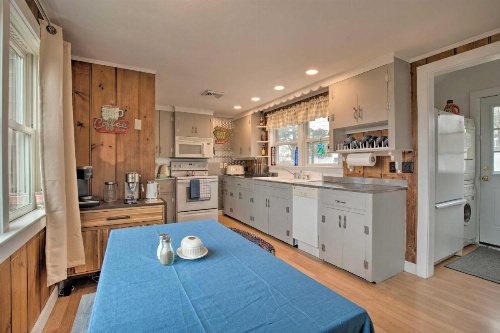 Waterfront Cape Cod Home with Sunroom and Fire Pit image 9
